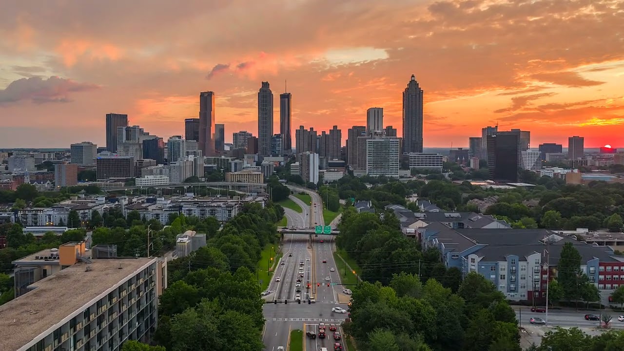 The Atlanta skyline at sunset, looking down Freedom Parkway toward downtown.