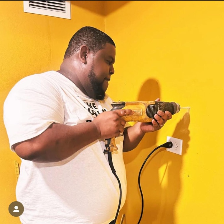 Ken building out the studio.